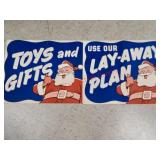 Store advertisement Santa toy and layaway signs