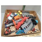 Various cars and small toys