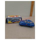 Vintage press down tin police car