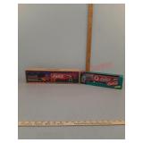 Lot of 2 Coca-Cola semi trucks