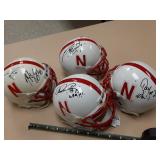 4 autographed mini helmets