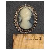 * Oval cameo resin brooch