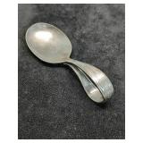 * Looped handle spoon silver?