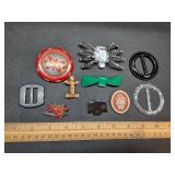 * Brooches & belt buckles