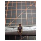 10kt gold and garnet ring,  size 10, tests 10k