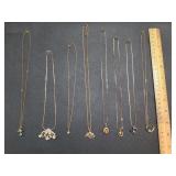 * Gold toned necklaces