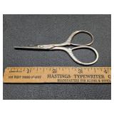 * Silver toned small scissors