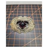 Gold tone sash pin purple stone art Nouveau