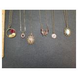 * Gold toned necklaces