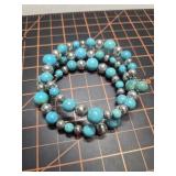 Turquoise and sterling silver beaded coil wrap