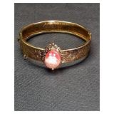 * Hinged carved shell cameo relief bangle