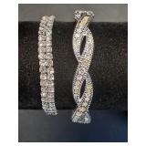* Hinged silver toned rhinestone cuff bracelet &