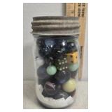 Jar of marbles and dice