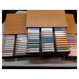 3 cassette holders w/ music cassette tapes
