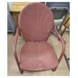 Red clam shell patio chair