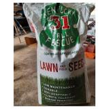 50lbs Fescue lawn seed mostly full & spreader
