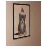 5 framed puzzle pictures on wall