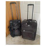 2 suitcases with wheels 24" x  15" x  8"d & 22" x