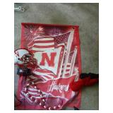 see all pics - Husker flags & other ( in closet )