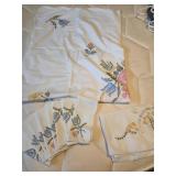 Embroidered tablecloths, napkins +