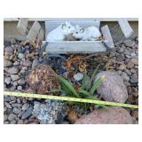 Pigs in a wagon & landscape rocks