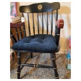 Black wooden chair with gold accents & official