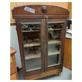 Wood arch top book case w glass doors