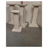 Tall decorative candle pillars/pedestals varying