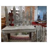 Wood picket bench and small fence