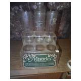 Misticks display, jars are glass
