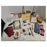 Mix of items: travel Scrabble,  button hole