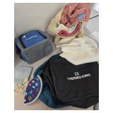 Duffle bags, cooler, tablecloths +