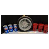 Tire clock, RC cola cans, Husker cups