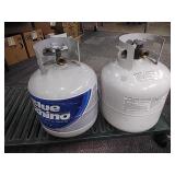 2 propane Bottles. Some contents
