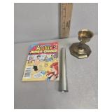 Archie comic, candle stick, and tube?