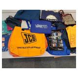 Large lot of tote bags, aprons, travel bags, some