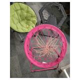 Black & pink bungee folding chairs & green padded
