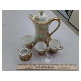 Nippon hand painted porcelain gilded carafe, cups