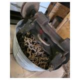 Chains, parts in galvanized tub