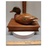 Wood duck on box