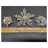* Old rhinestone brooches
