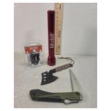 Maglite, Camillus hatchet, treesaw, battery