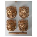 4- lion head wall sculptures