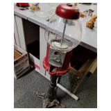 Gumball machine on cast iron base
