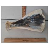 Folk art native painted on a scapula