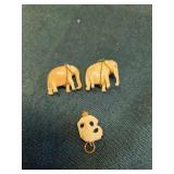 Bone? caved elephant pendants