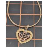 14kt gold necklace with 10kt angel pendant