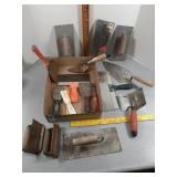 Concrete, masonry, and drywall hand tools.