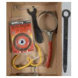 Wire brush, oil filter wrench, wall hooks +