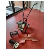 >Earthquake mini cultivator w/ attachments.